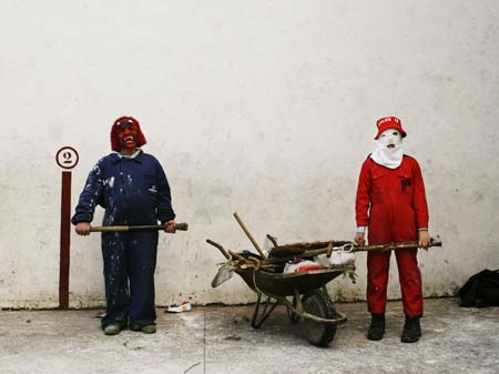 Revellers attend a traditional carnival celebration in Zubieta, in the northern Spanish region of Navarra, January 30, 2007. Every year men from Ituren parade to the neighbouring town of Zubieta to join the traditional carnival which is considered a festival to welcome the spring after a tough winter in the deep valleys of the northern Navarra region. 