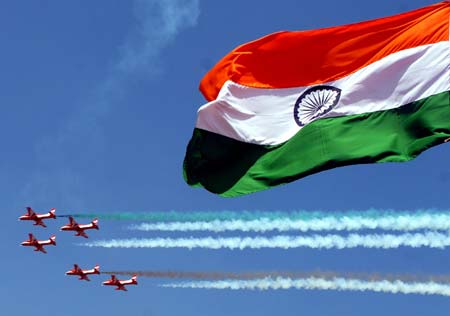 Pilots from the Surya-Kiran aerobatic demonstration team of the Indian Air Force perform during the 