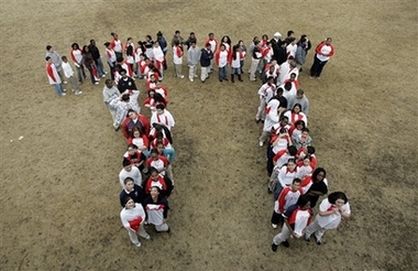 Students from the Maurice J. Tobin School makes a human Pi symbol at the school in Boston, Tuesday, March, 13, 2007, during a celebration of Pi Day. Pi Day is an unofficial holiday in the math community, observed each year on the 14th day of the third month. (AP Photo/Chitose Suzuki) 