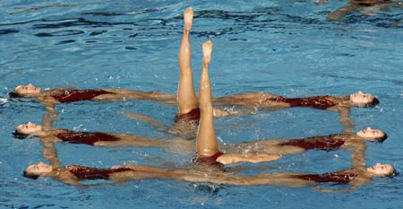 Members of the Japanese team perform in the synchronised swimming free combination routine preliminary round at the World Aquatics Championships at Rod Laver Arena in Melbourne March 17, 2007. 