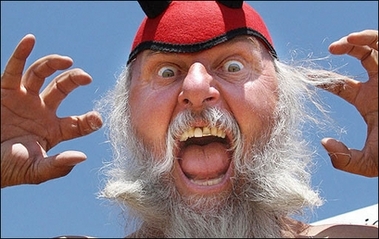 German fan Dieter Senft, known as El Diablo, poses with his devil costume in Saint-Maximin la-Sainte-Baume near Marseille as he waits for the riders, during the tenth stage of the 94th Tour de France cycling race between Tallard and Marseille.[AFP]