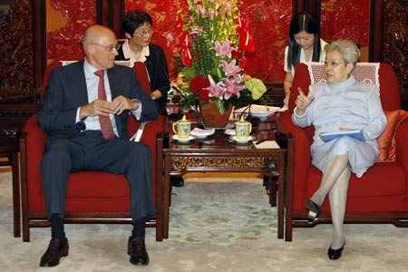 U.S. Treasury Secretary Henry Paulson (L) sits with China's Vice Premier Wu Yi during talks at Zhongnanhai in Beijing July 31, 2007. 