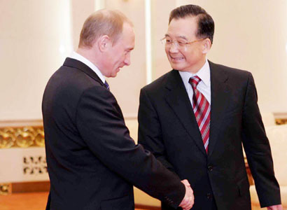 Premier Wen meets with Putin