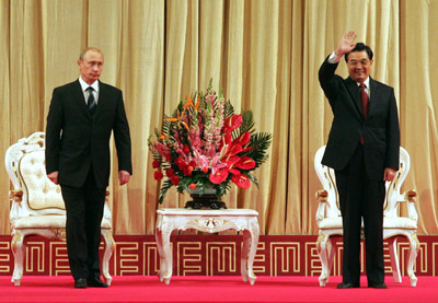 President Hu and Putin attend the opening ceremony