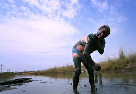 Mud bath at salt-works lake