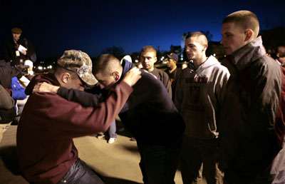 Students comfort each other after nightmare morning