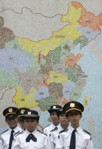 Students rehearse raising national flag