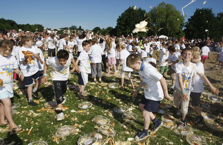 Children fight a merry custard pie fight