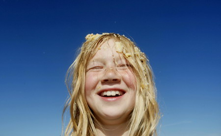 Children fight a merry custard pie fight