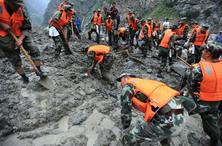 Rescue continues after landslide kills four in Sichuan 