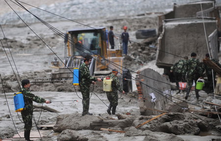 Rescue continues after landslide kills four in Sichuan 