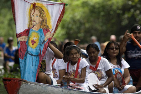 Annual Caraparu River procession in Amazon jungle