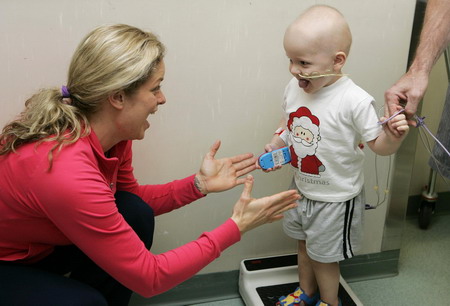 Clijsters spreads care and love in Aussie's Children Hospital