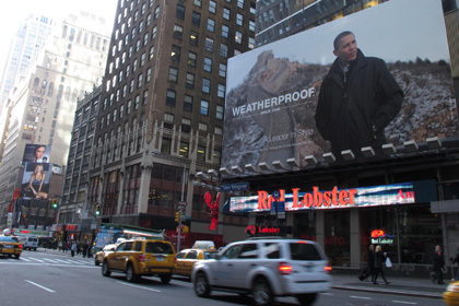 Times Square billboard depicts Obama at Great Wall
