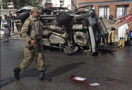 Suicide bombs kill dozens in Pakistan