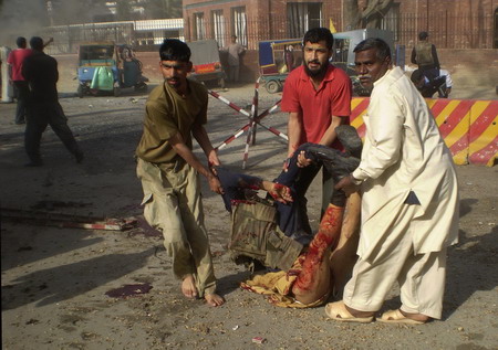 Suicide bombs kill dozens in Pakistan