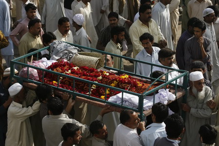 Suicide bombs kill dozens in Pakistan