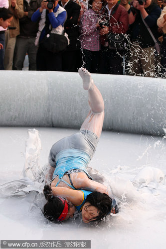 Mud wrestling contest in Hainan