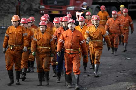 Rescuers race against time for trapped miners