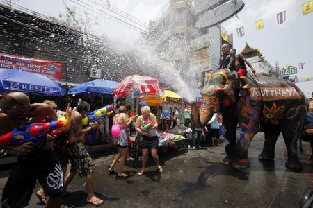 People celebrate Water-splashing Day in Thailand