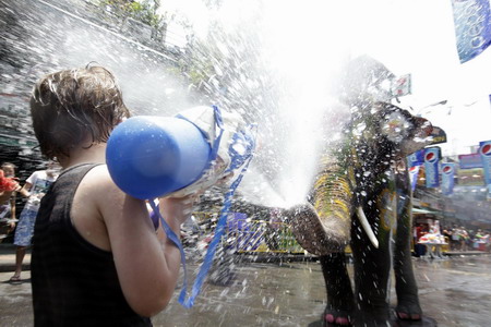 People celebrate Water-splashing Day in Thailand