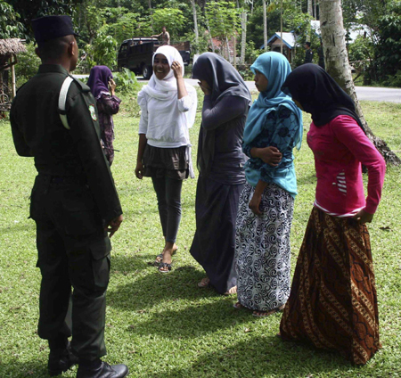 Women caught wearing tight pants given skirt in Aceh