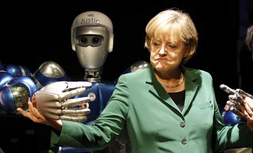 Merkel greets robot at Air Show