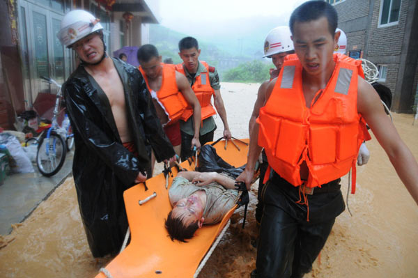 24 missing after landslides engulf vehicles