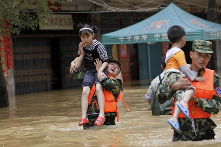 Residents evacuated after dyke breach in Jiangxi