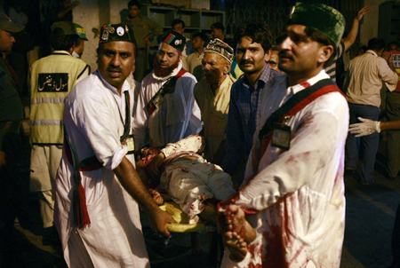 At least 41 killed in bomb blasts at Pakistan shrine