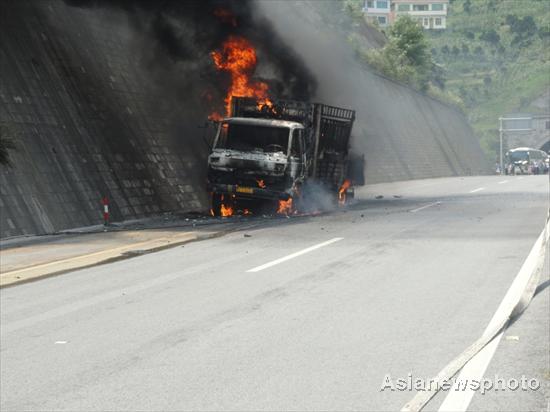 Fire engulfs truck in SW China