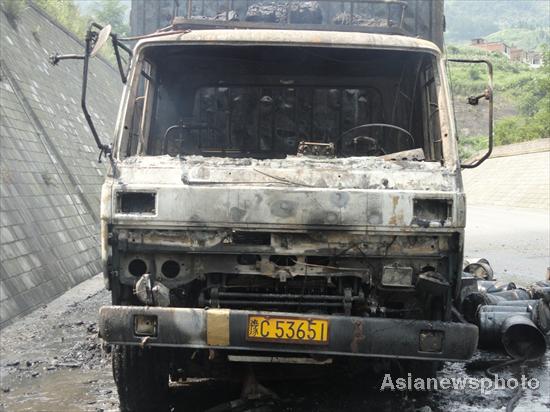 Fire engulfs truck in SW China