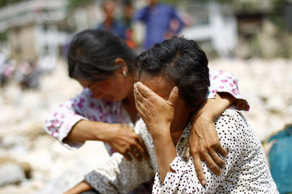 Sorrow in the air after NW China landslide