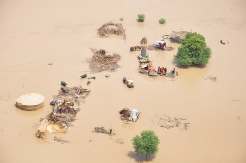 Marooned family mergered in floods in Pakistan