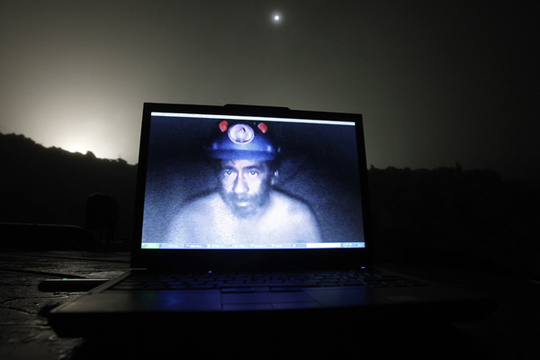 Trapped miners make video message in Chile