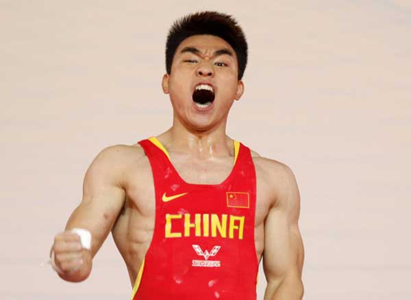 Liao Hui breaks weightlifting world records