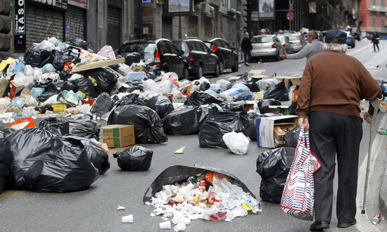 Stinky garbage piles in Naples street, Italy