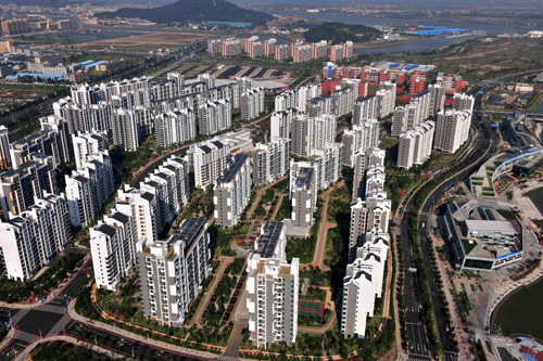 Chinese team moves in as Athletes Village opens