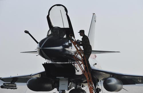 Chinese aerobatic team perform at air display