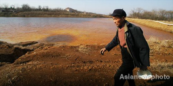 Plant leaves behind polluted farmland