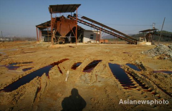 Plant leaves behind polluted farmland