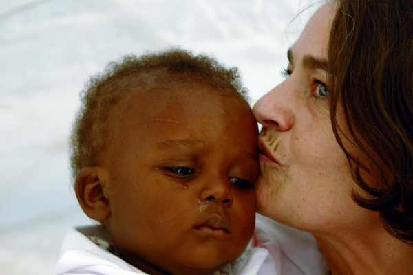 Haitian orphans join adoptive French families