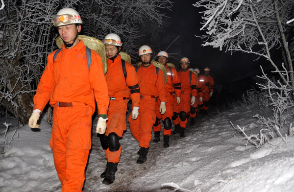 Firefighters help farmers stranded in snow