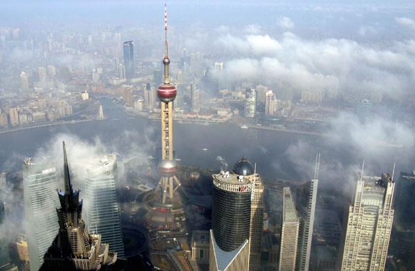 Fog clouds Shanghai's skyscrapers