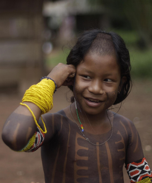 Body painting for Kayapo people in N Brazil