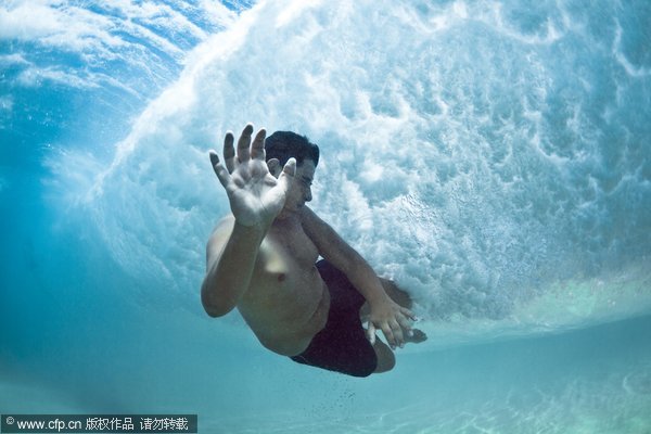 Swimmers battle power of ocean