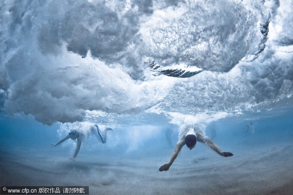 Swimmers battle power of ocean