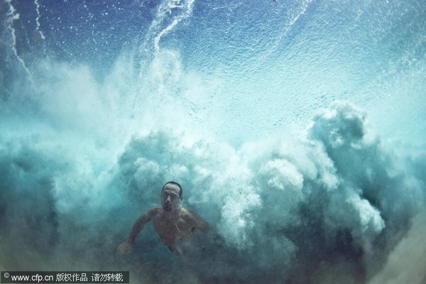 Swimmers battle power of ocean