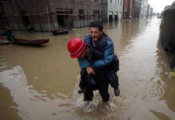 Worst floods in 56 yrs inundate E China village