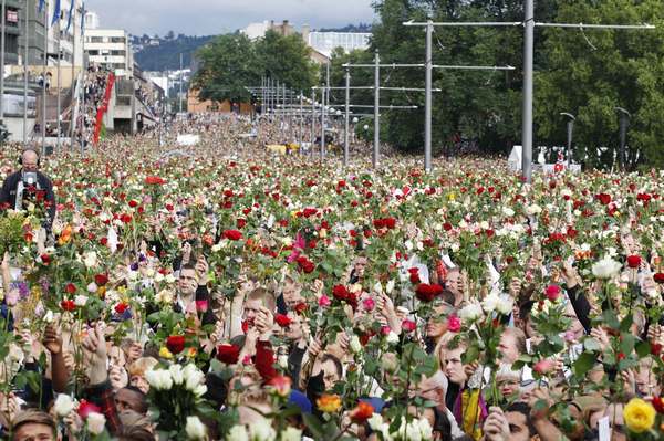 Sea of flowers marks vigil for twin attack victims